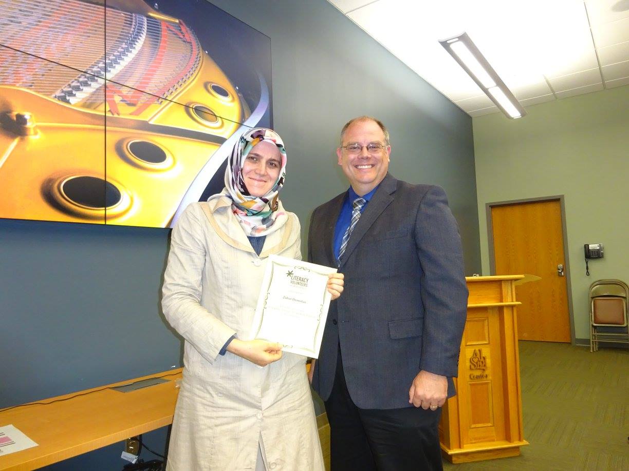 LVR Board Member Dave Adams presents a recognition certificate to Zuhal Demirtas